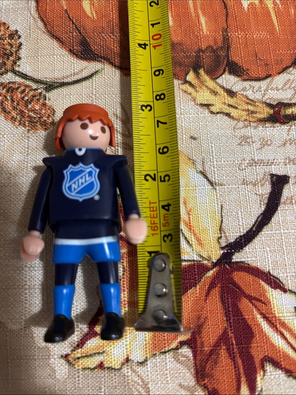 NHL Collectible Hockey Figure in Blue Jersey with Orange Hair